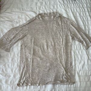 Earthbound tan shirt, size large.